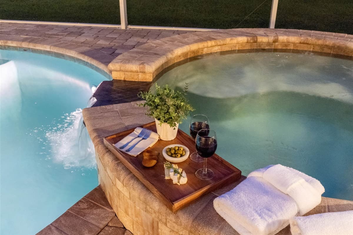 Adjacent to the pool is the inviting spa, a luxurious hot.
IMPORTANT NOTE: The spa isn’t a traditional hot tub. It has jets, but it’s designed more for relaxing than for a full hot tub or sauna experience.