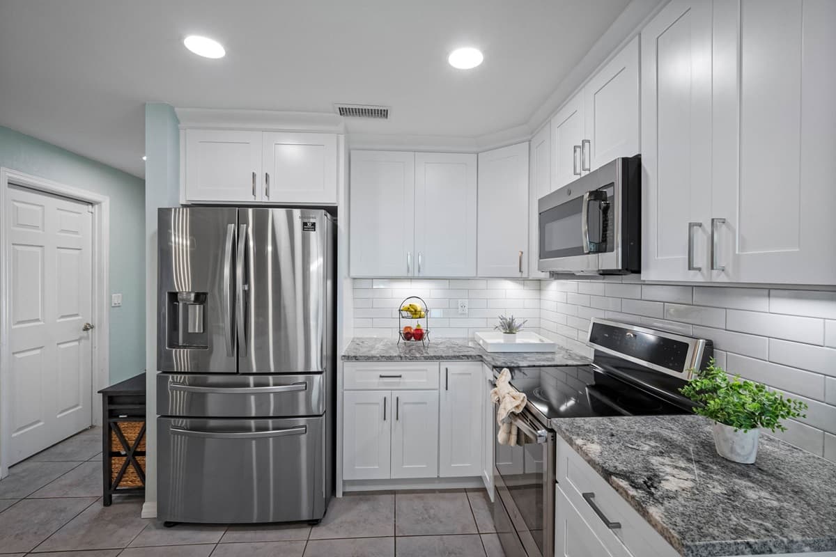 From stainless steel appliances to the chic pendant lighting, every detail was designed with comfort and convenience in mind.