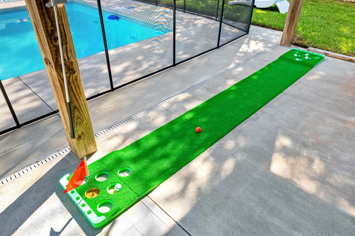 Mini-golf, cornhole, and plenty of space for outdoor play make this yard a hit for all ages.