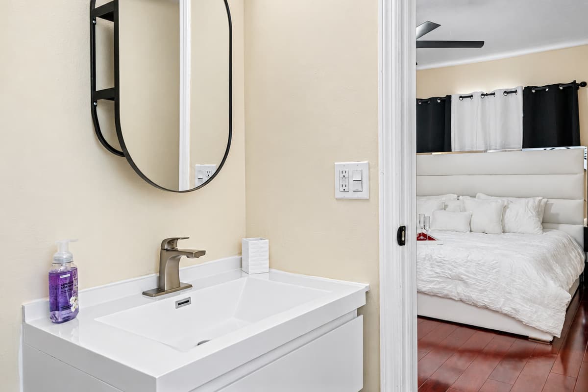 Our bathroom features a minimalist and clean design!