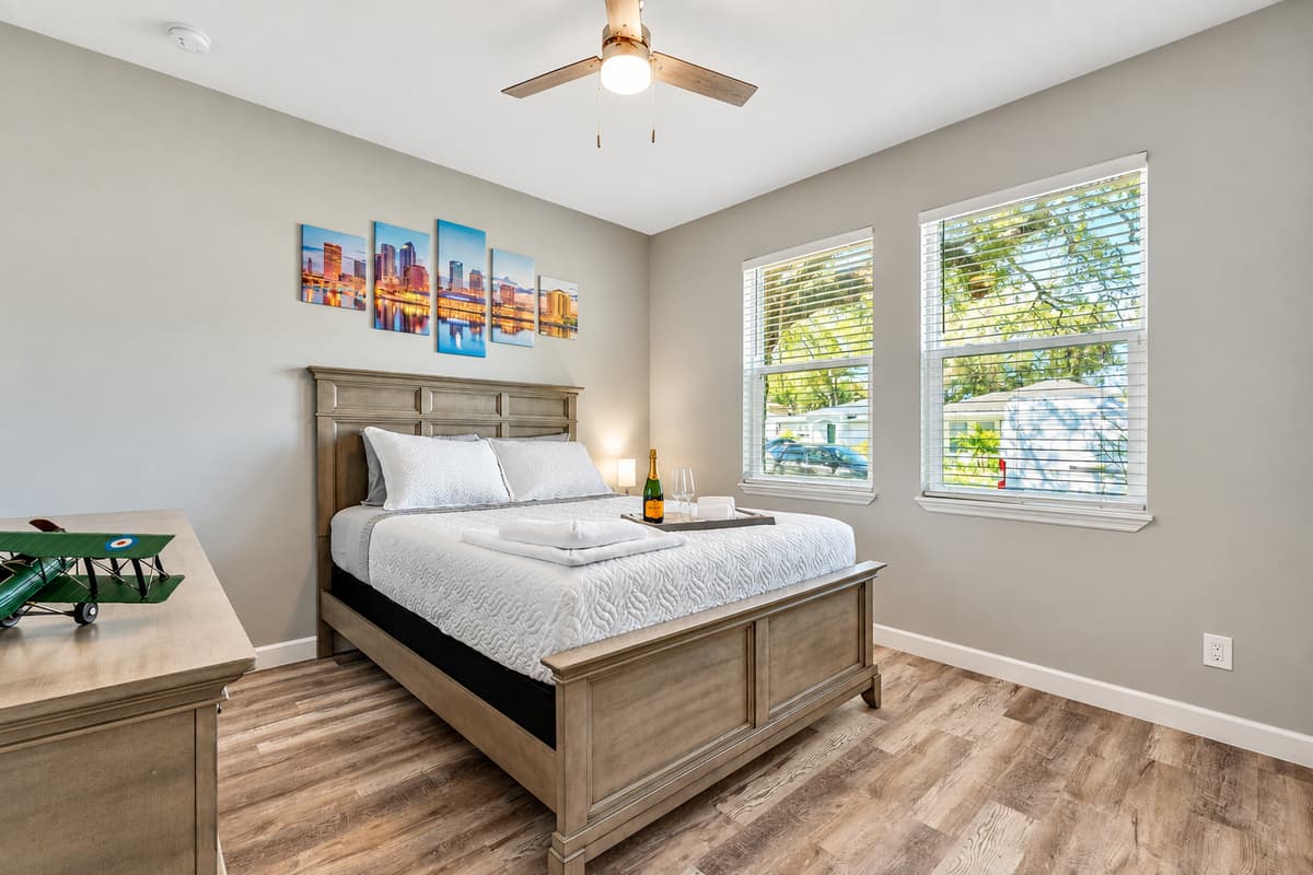 At the heart of this inviting space lies a sumptuous king-size bed, beckoning you to sink into its plush embrace and drift off into a restful slumber.