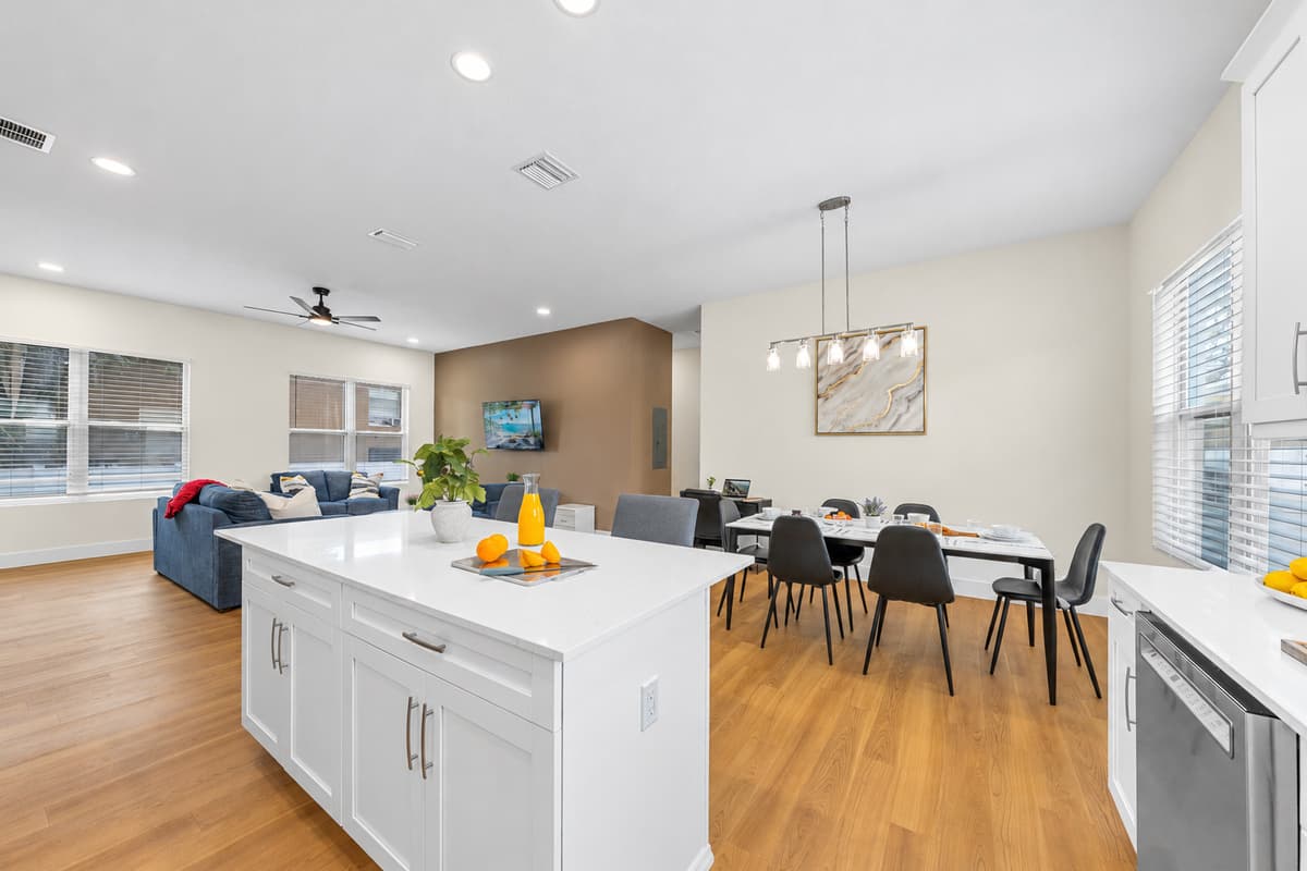 From kitchen to dining to living room, the open floor plan makes this space feel like home.