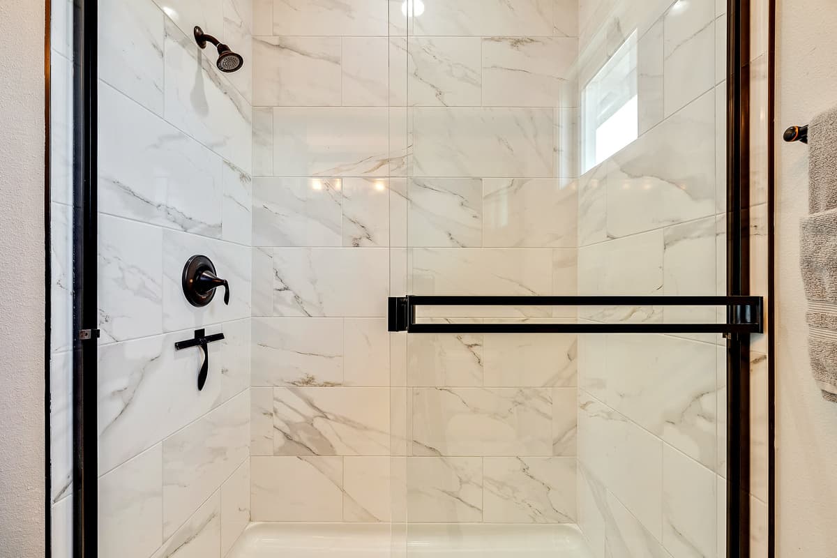 This bathroom, an epitome of contemporary efficiency, boasts a sleek design and cutting-edge features for optimal functionality.