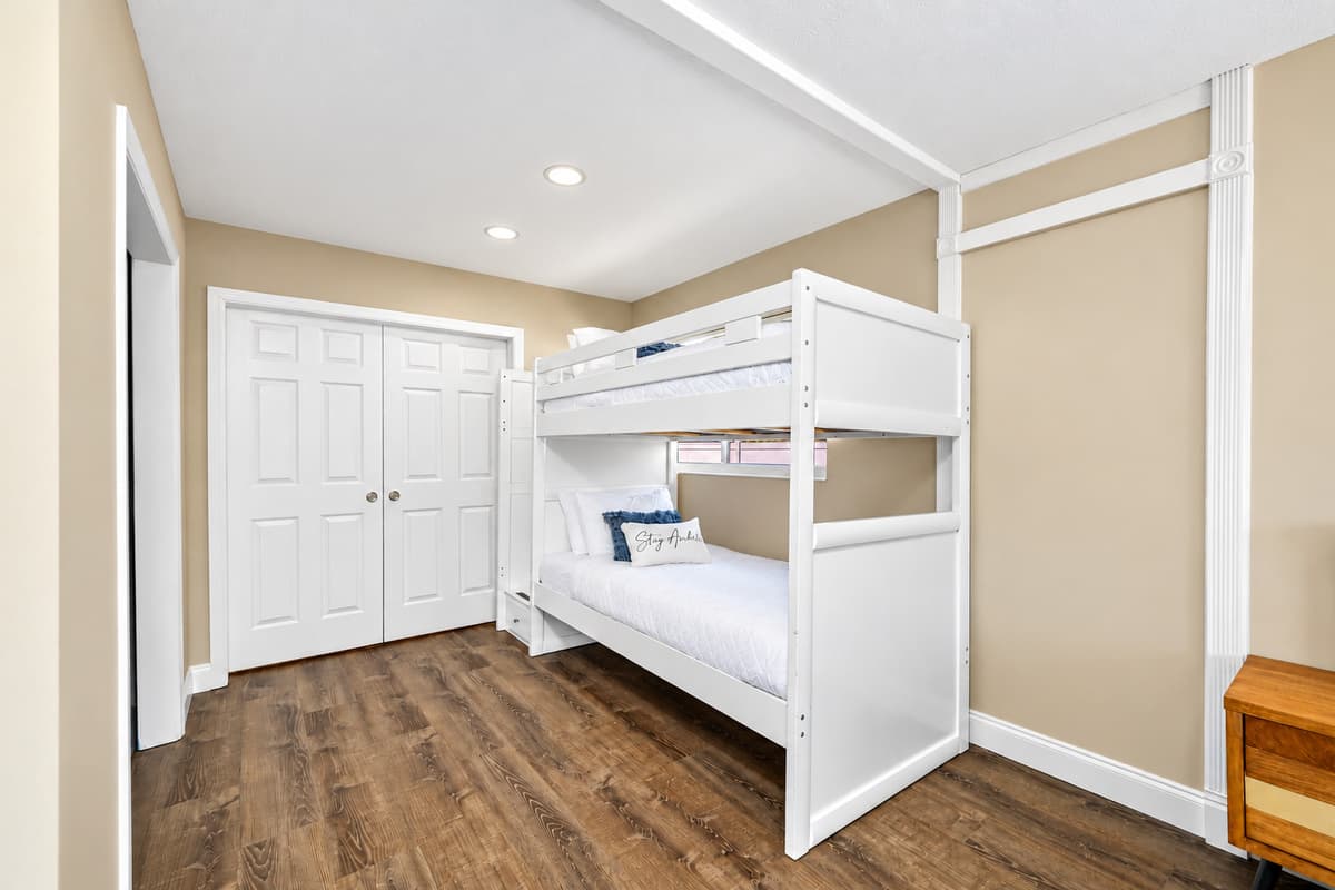 Bunkbed and a queen size bed for a small family or a group of friends who wants to hang out and sleep in one room. It is very spacious and has a very nice view. If you are interested to book this house, Send us a message now!