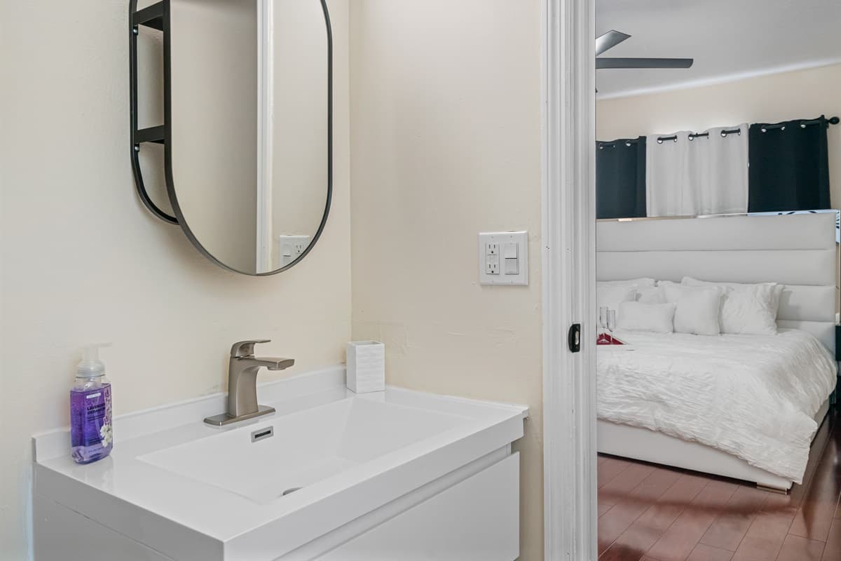 Our bathroom features a minimalist and clean design!