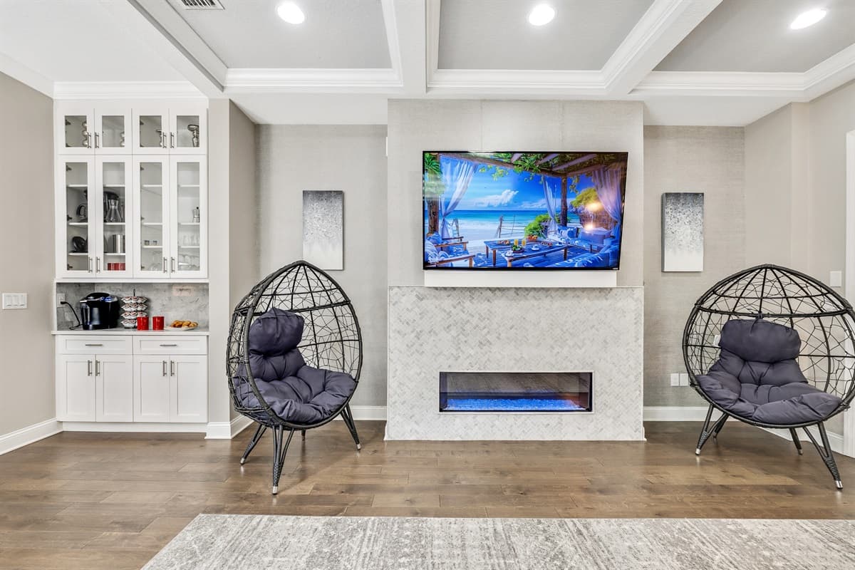 Every detail, from the luxurious couch to the ambient lighting, has been meticulously chosen to ensure your experience is nothing short of exceptional.