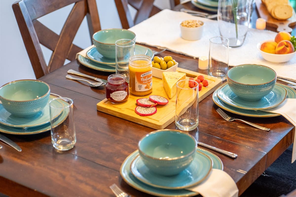 The perfect setting for delicious meals and quality time, this dining space offers charm, warmth, and plenty of seating for the whole group