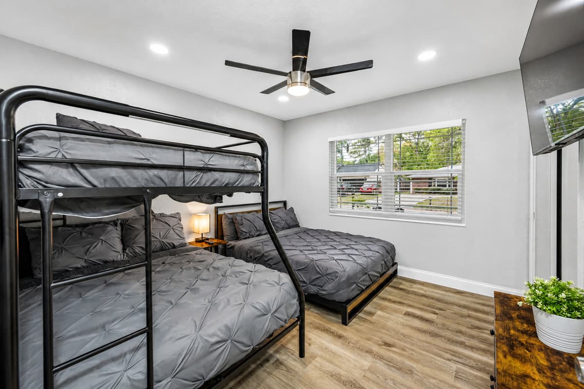 Bringing your kids on this trip? This room would be amazing for them to have! This bedroom has a king size bed and a bunk bed!