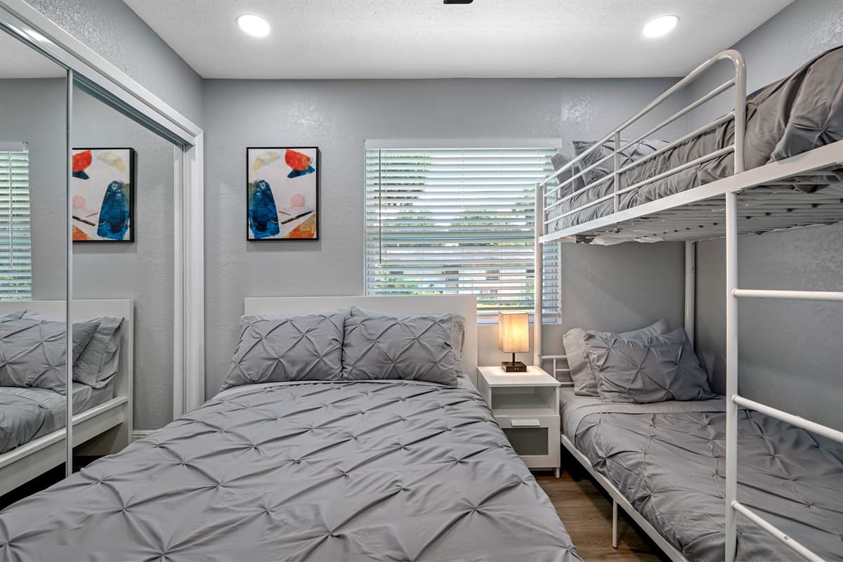 Kids will sure love this elegant bedroom for sleepovers! It has a queen sized bed, single bunkbed, drawers, and a smart TV!