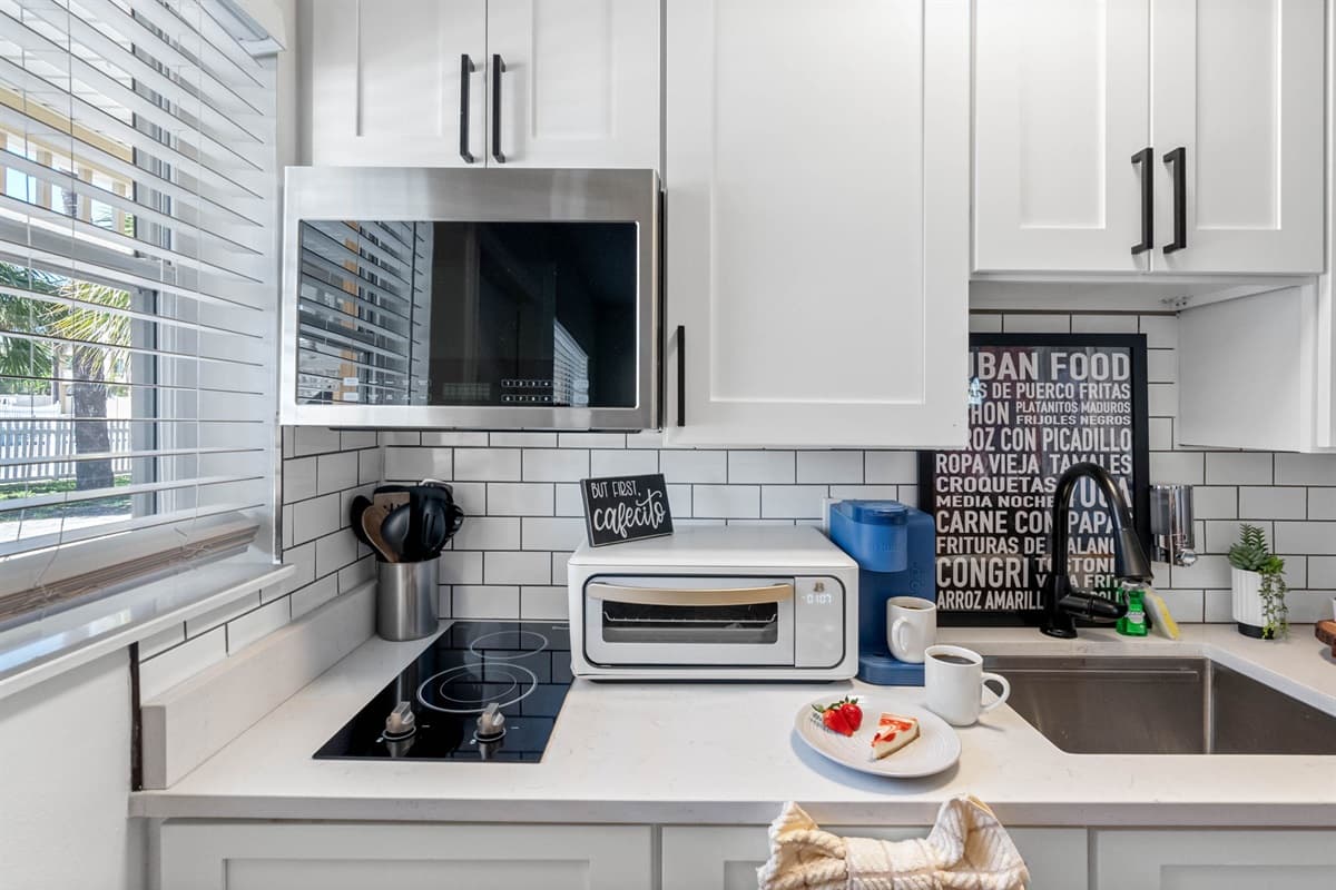 From stainless-steel appliances to granite countertops, this kitchen combines style and functionality seamlessly.