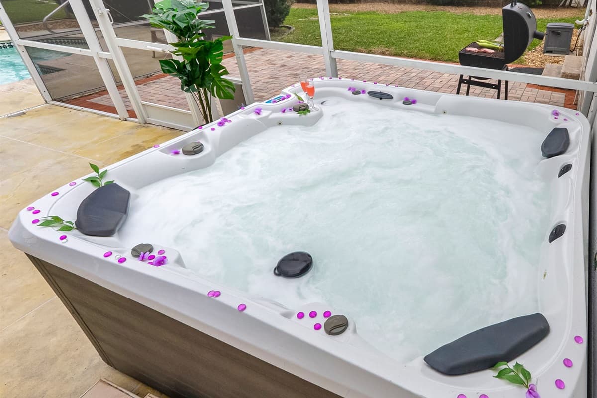 Relax and unwind in the private outdoor hot tub, perfect for soothing evenings after a day of fun.
