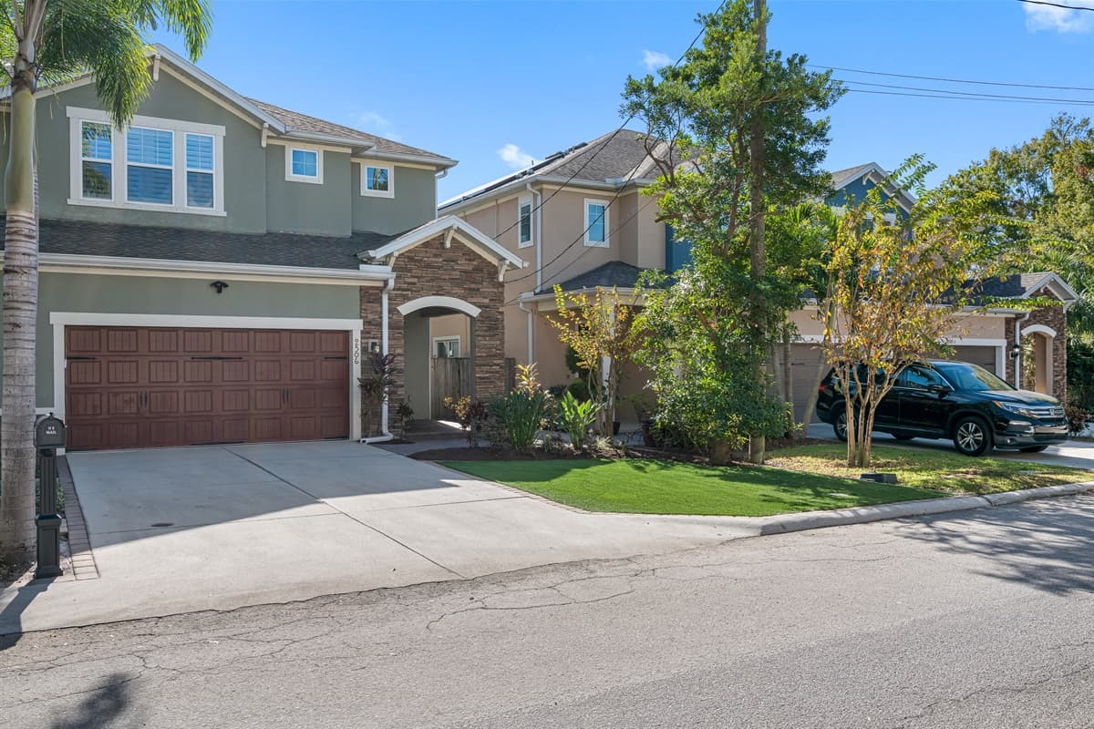 Incredible front view of the house showcasing our beautiful front yard with trees, cute plants and our spacious driveway. If you are interested in this property, don't hesitate to send us an inquiry as soon as possible!