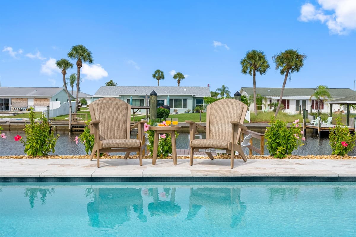 Your very own backyard retreat featuring a crystal-clear pool just steps from the house.