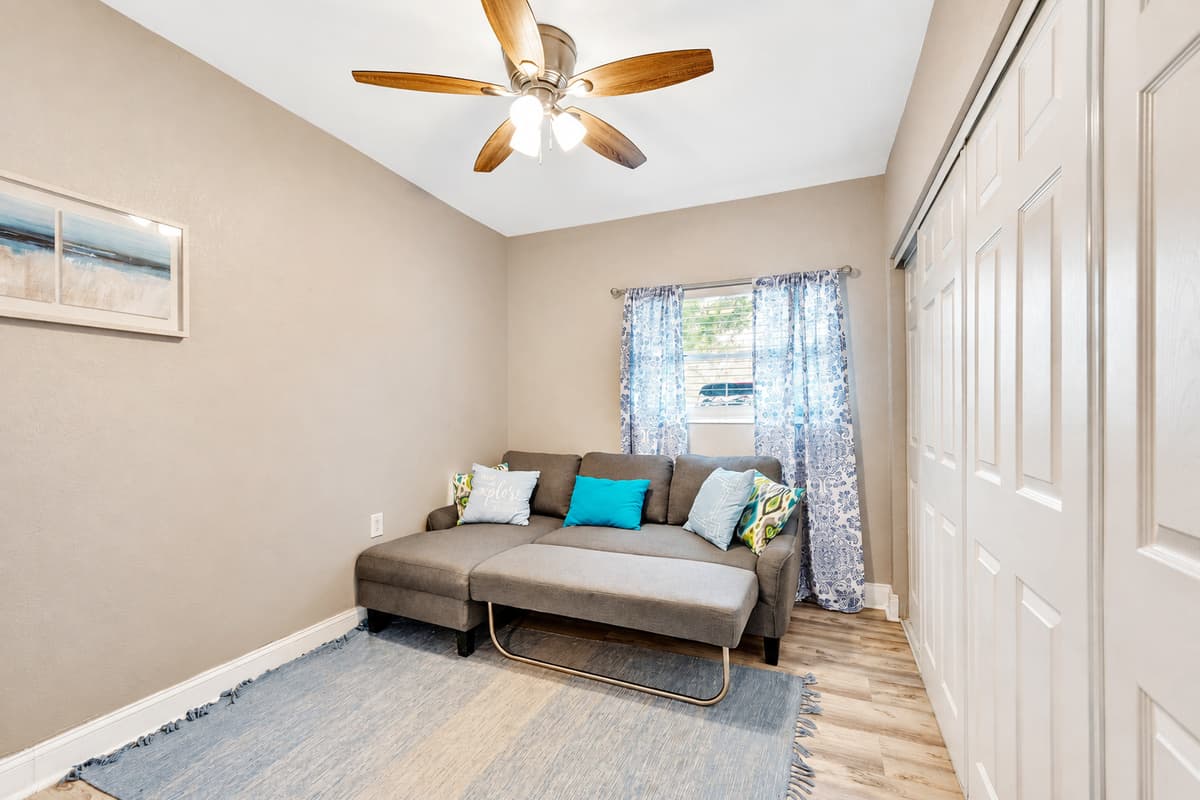 Discover the versatility of our master bedroom, where comfort meets convenience.