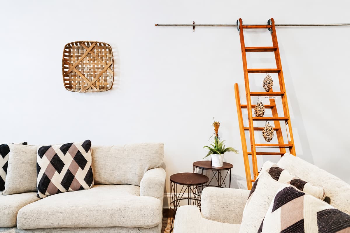 Curl up with a book or enjoy a quiet conversation in this charming seating area with unique coastal décor.