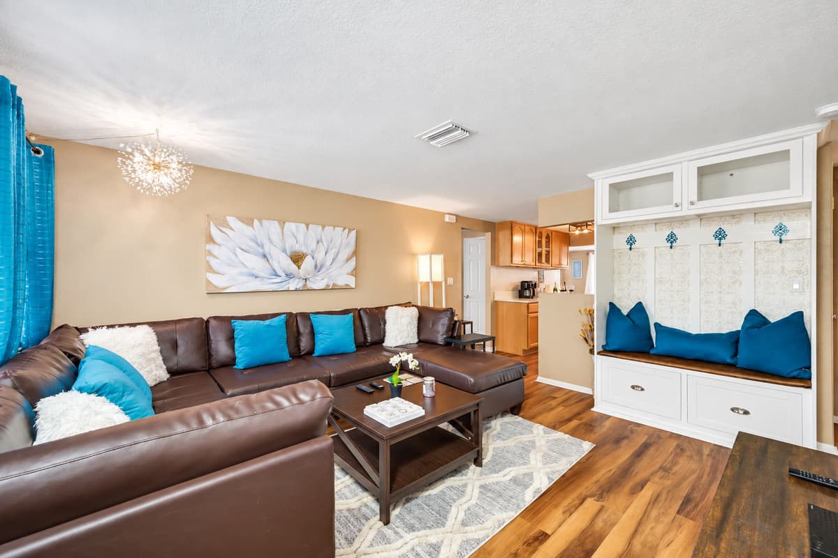 Spacious living room with comfortable modern L-Shaped couch where you and your family and friends can bond and relax. If you have any questions about this property, please don't hesitate to send us an inquiry.