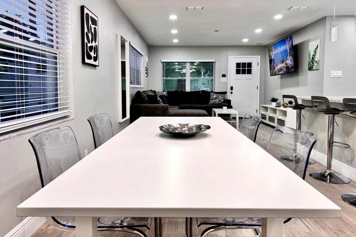 Whether you're enjoying a leisurely family brunch, a romantic dinner, or a fun game night, this space is as versatile as it is inviting.