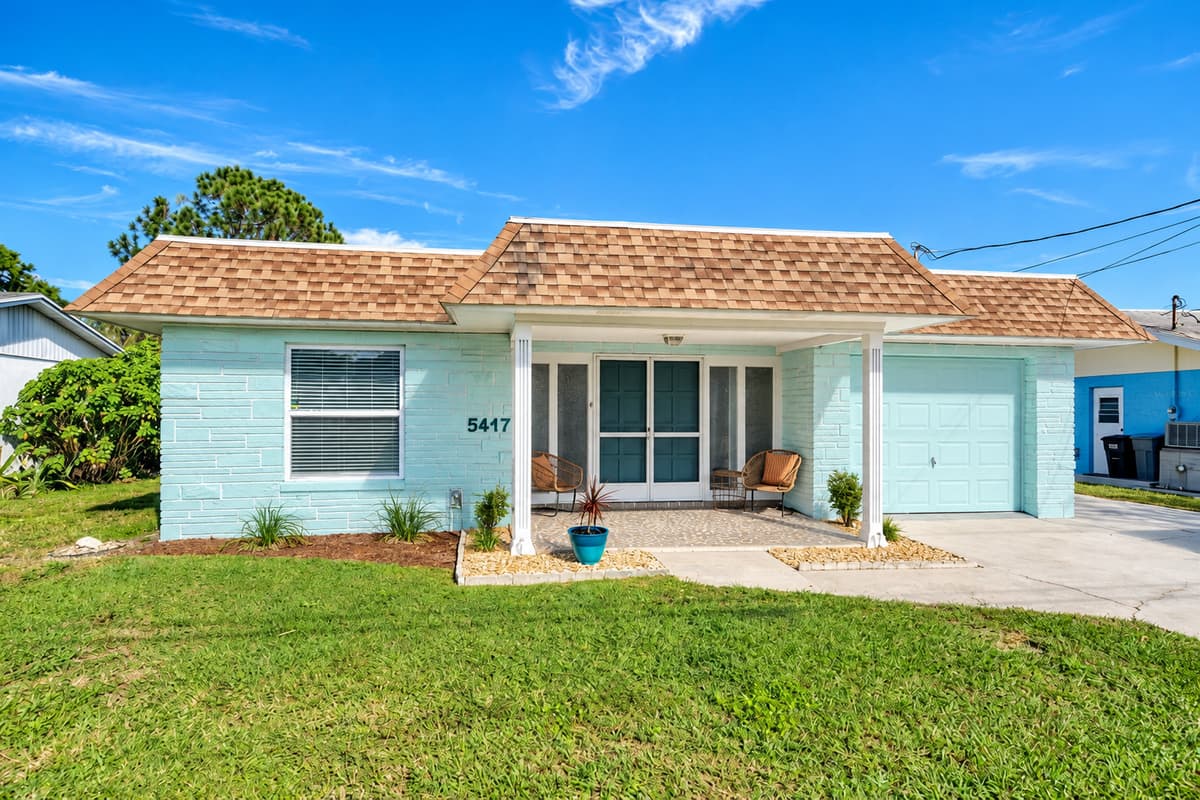 Immerse yourself in the beauty of the house's exterior and its inviting front yard.