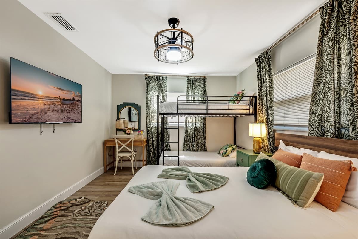 Each bed is meticulously prepared with plush bedding, ensuring a restful night's sleep for every guest.