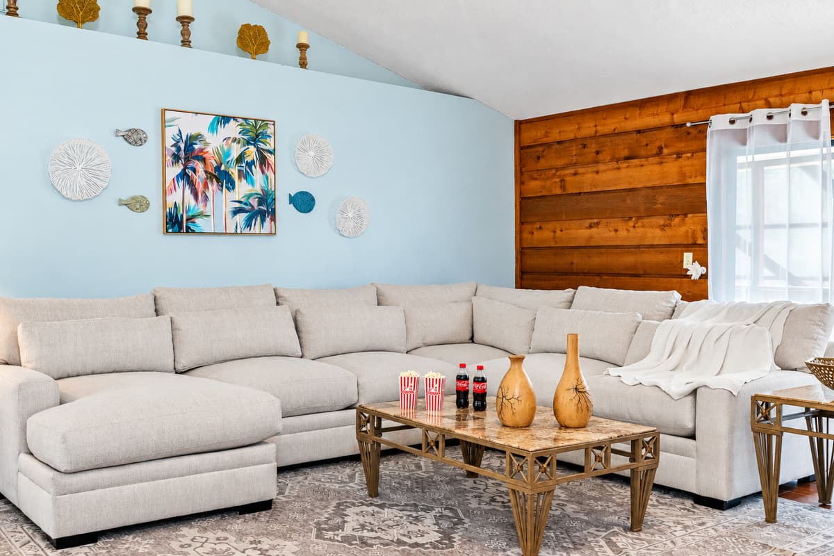 Accented with throw pillows and extra-deep seating, it's perfect for mid-day naps, family lounging, or curling up with a book and a breeze.