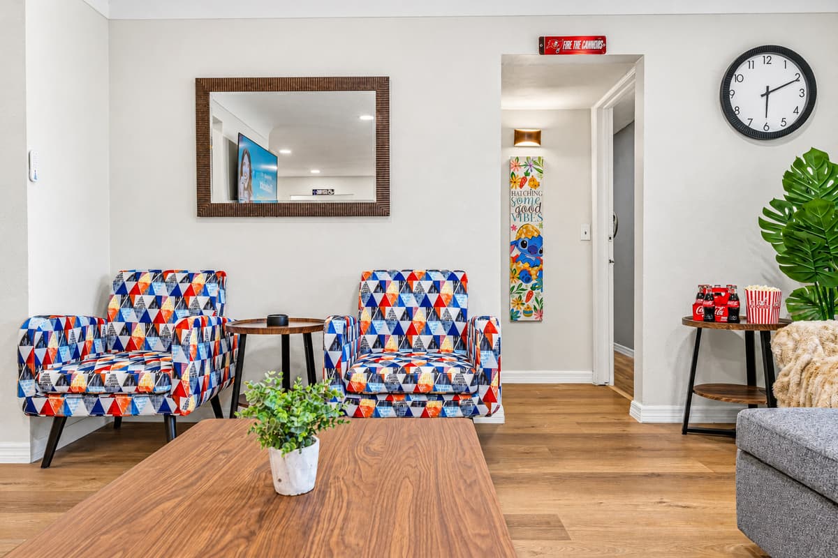 Additional seating area with accent chairs—perfect for relaxing or casual conversation 