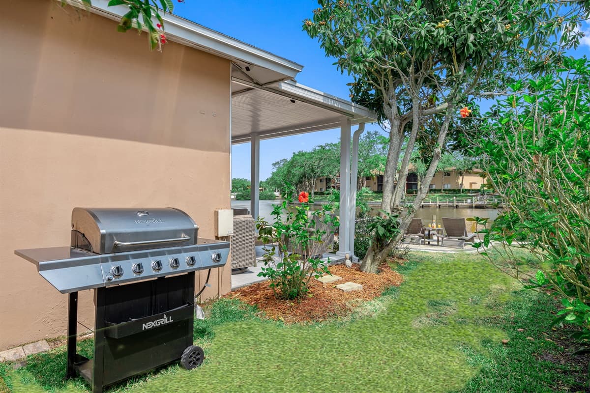 Adjacent to the patio, you'll find a dedicated grilling area, perfect for those delightful outdoor barbecues.