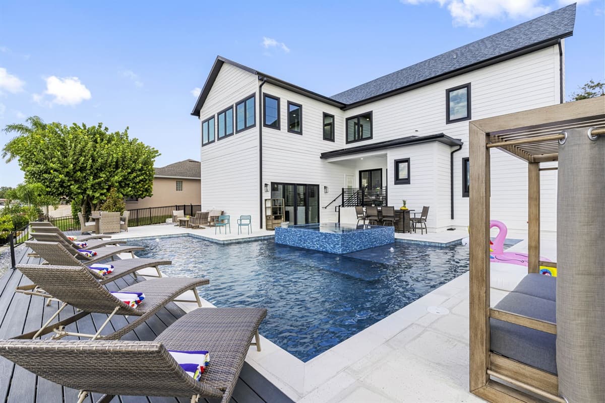The spacious, crystal-clear pool is kept at a comfortable temperature, perfect for swimming year-round.