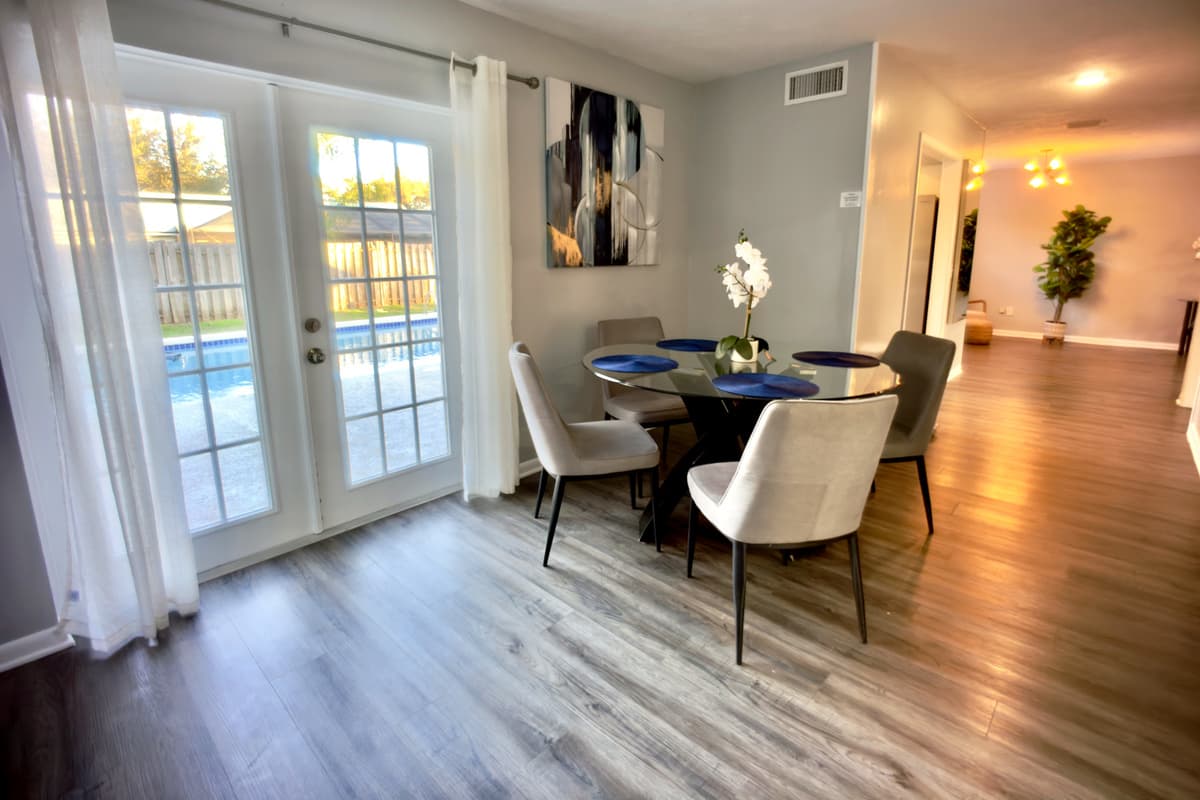 The stylish dining area provides ample seating for a memorable dining experience.