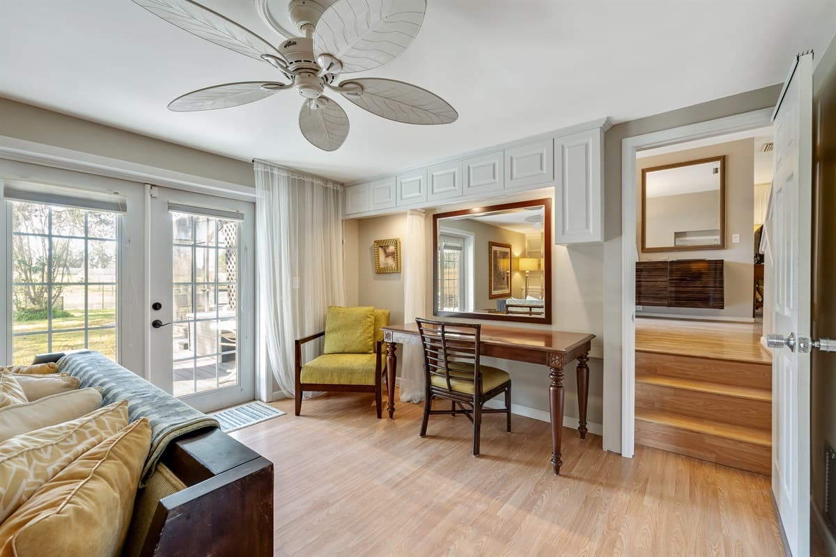 Surrounded by tasteful decor and bathed in natural light streaming in through the windows.