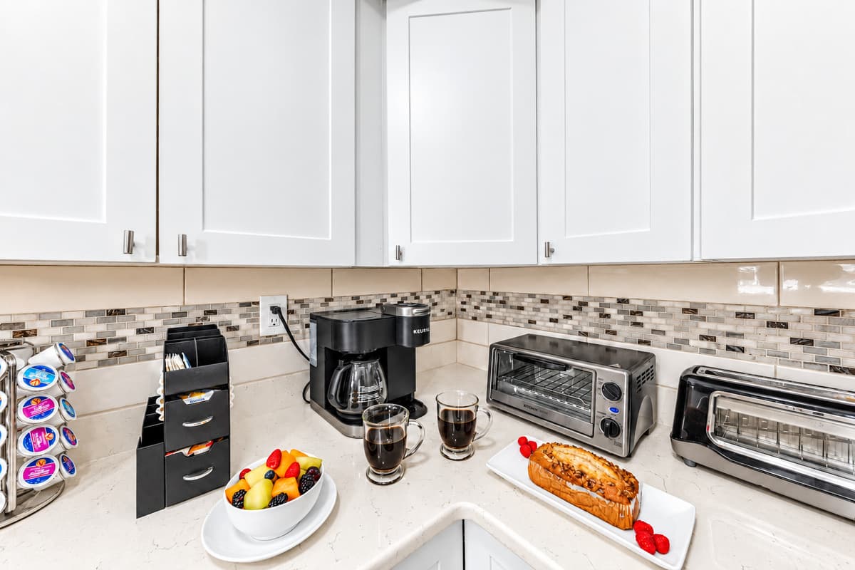 Coffee station complete with a Keurig, toaster, and essentials for a great start to your day.