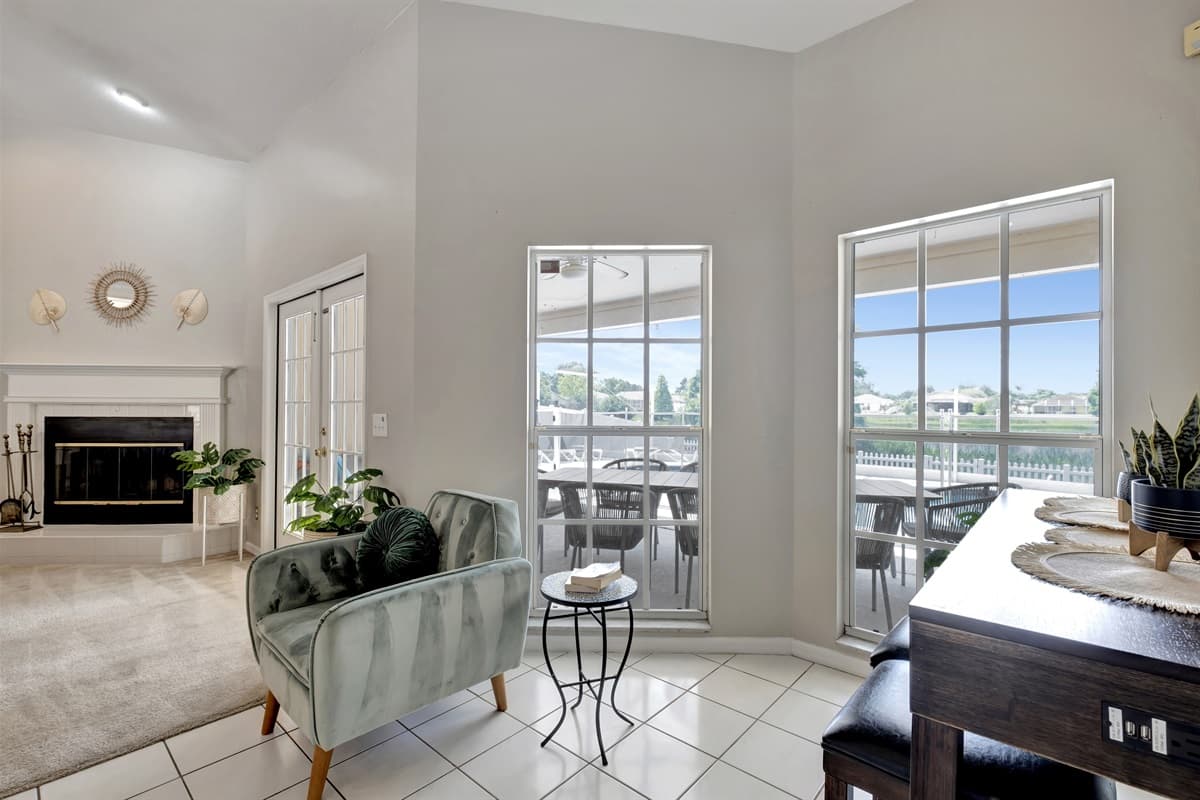 Whether you're seeking solace by the fireplace, engaging in lively conversations, or enjoying quality time with loved ones, this inviting space is sure to leave a lasting impression.