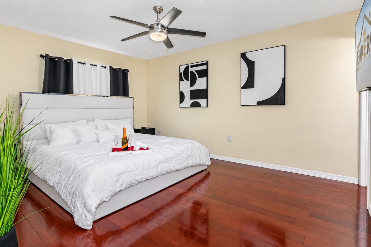 The bedding is made of the finest quality materials, with crisp white linens and fluffy pillows that are sure to lull you into a blissful sleep.