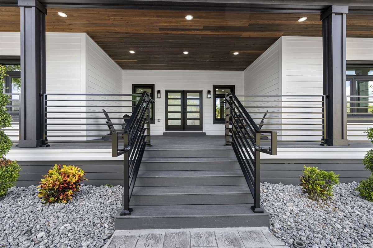 The front porch exudes a warm and welcoming atmosphere, designed to make you feel right at home.