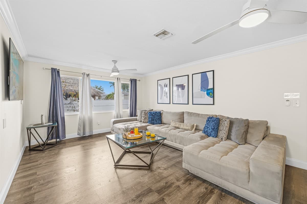 Gather together in the cozy living room with ample seating for the whole group.