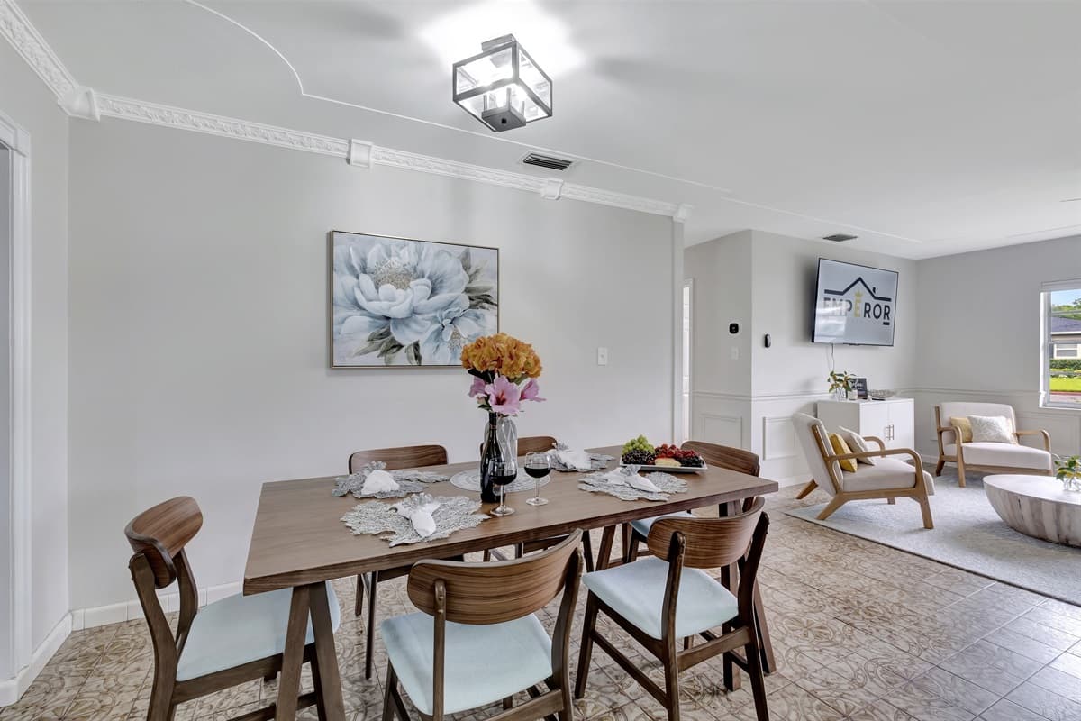 This inviting space is where family and friends come together to savor delectable meals, share laughter, and create lasting memories.