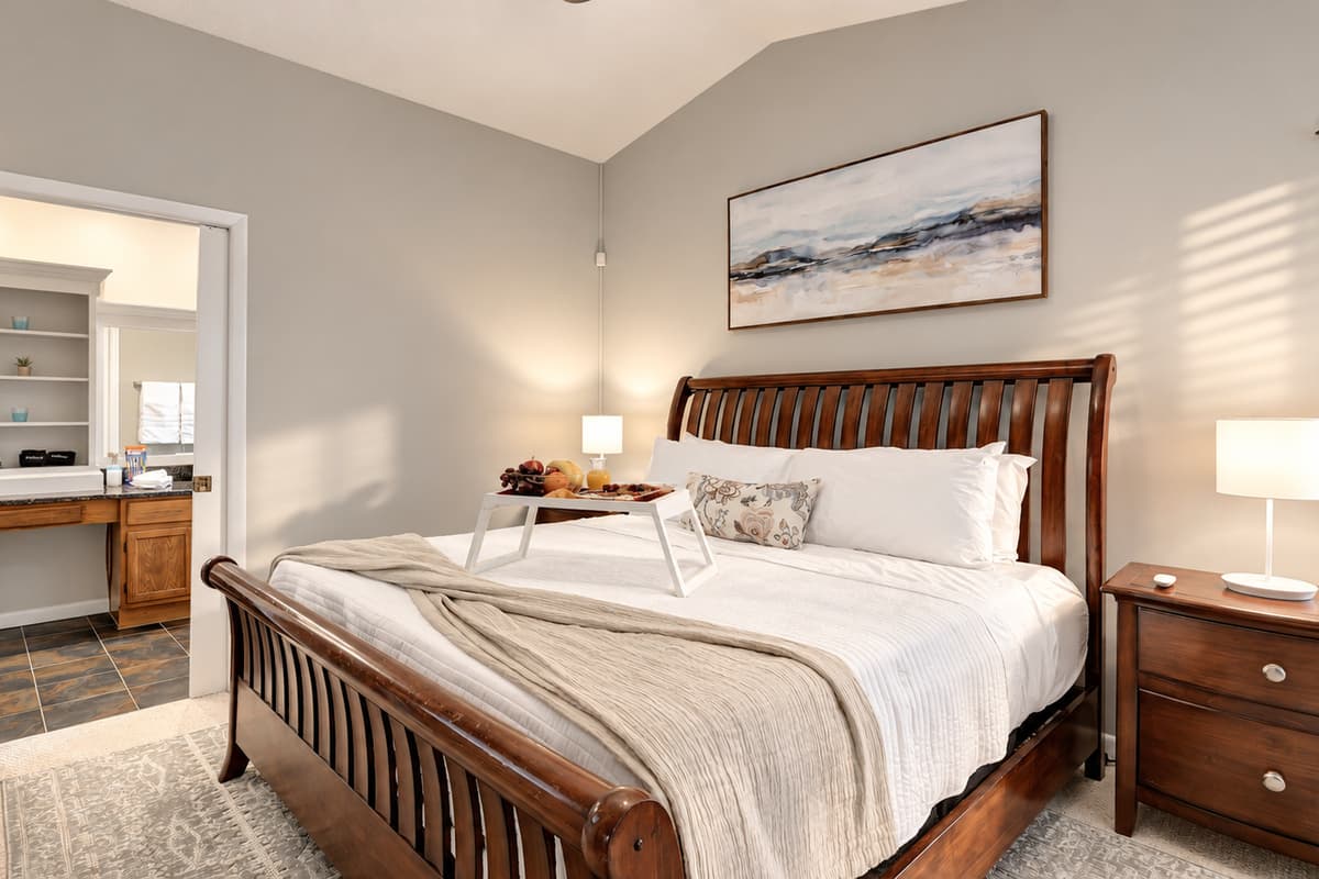 Experience the epitome of comfort in the Master's bedroom, where a grand king-size bed welcomes you to unparalleled luxury.
