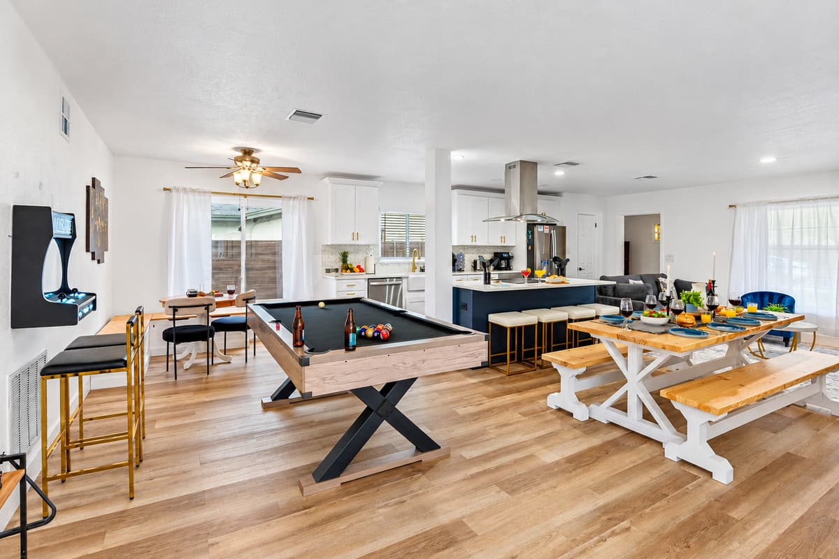 Welcome to your private game zone—complete with a full-size pool table, classic arcade machine, and foosball for hours of family fun!