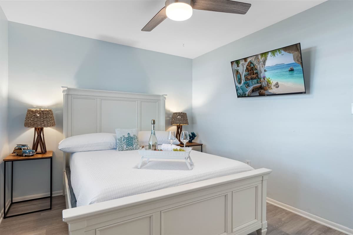 The room’s relaxing color palette, combined with tasteful décor, creates a soothing ambiance that makes it easy to unwind after a long day.