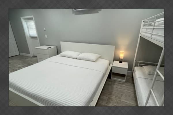 This thoughtfully arranged room includes a king-size bed plus a bunk bed, making it a great setup for parents traveling with children. *Updated photos will be added soon!