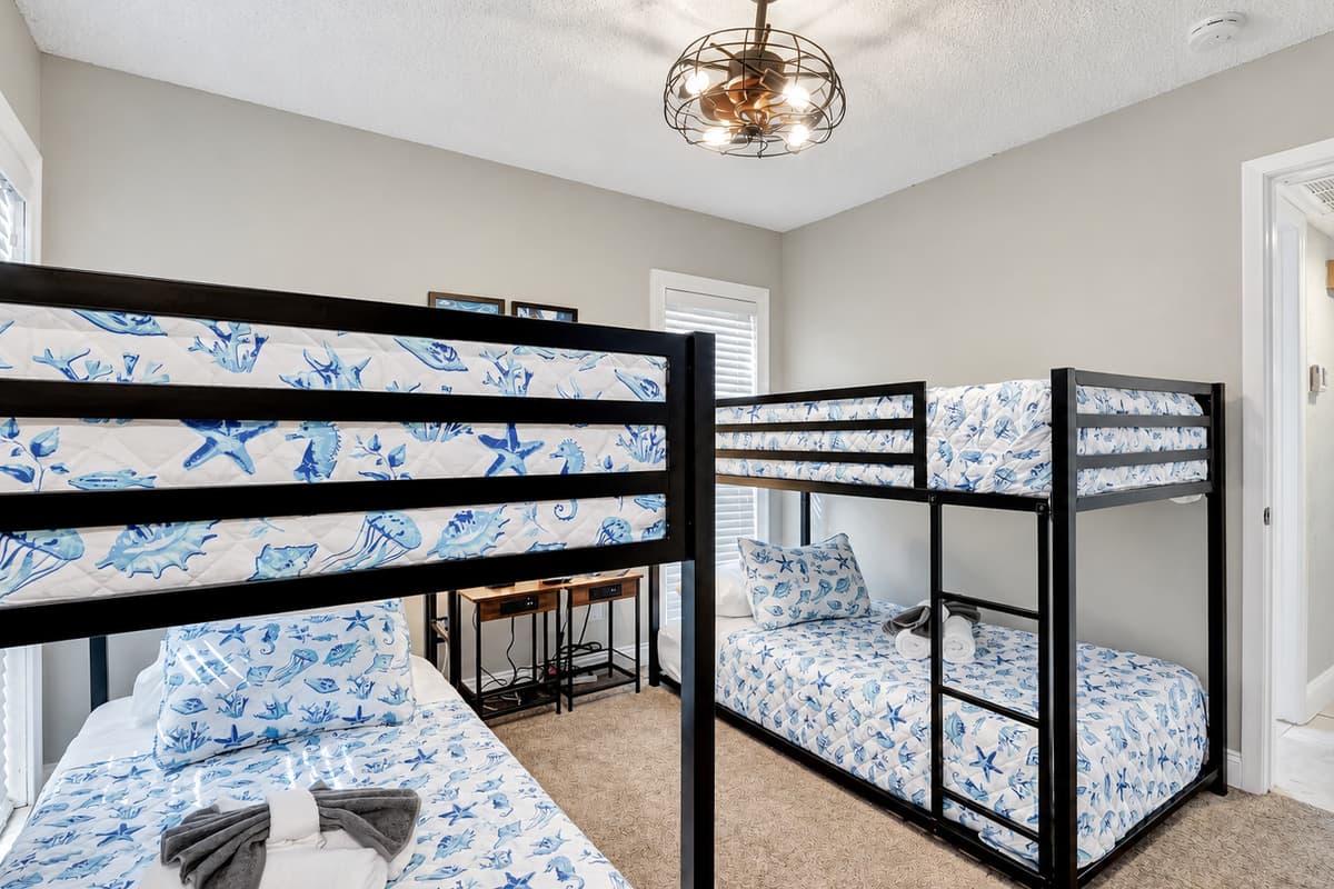 This cozy bedroom is tailor-made for a perfect family retreat or a memorable getaway with friends.