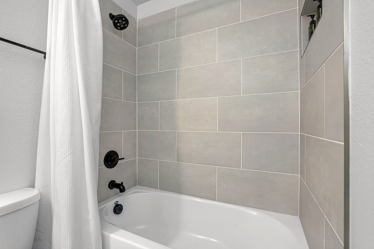 Step into the world of indulgence and sophistication with the stylish bathrooms awaiting you in this exquisite residence.