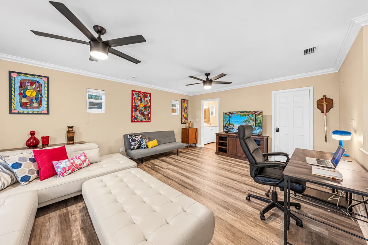Open living and workspace combo with stylish furnishings and plenty of room to spread out comfortably.