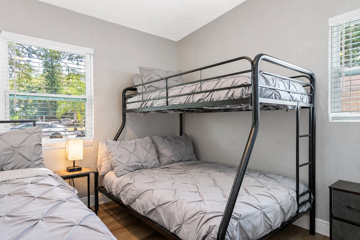 The queen size bed is perfect for a good night's sleep, while the bunk bed is great for children or extra guests.