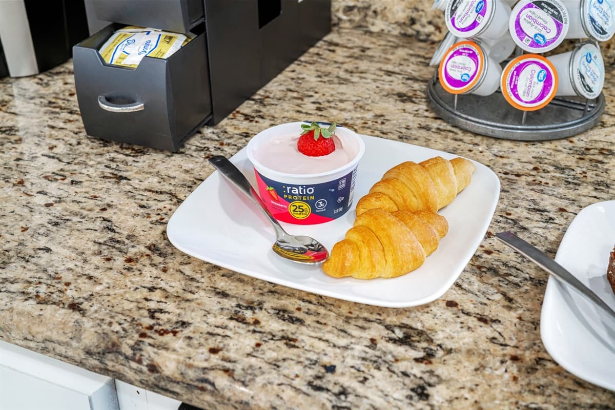 The kitchen itself features modern appliances, ample countertop space, and all the cookware, utensils, and essentials you need to prepare your favorite homemade dishes.