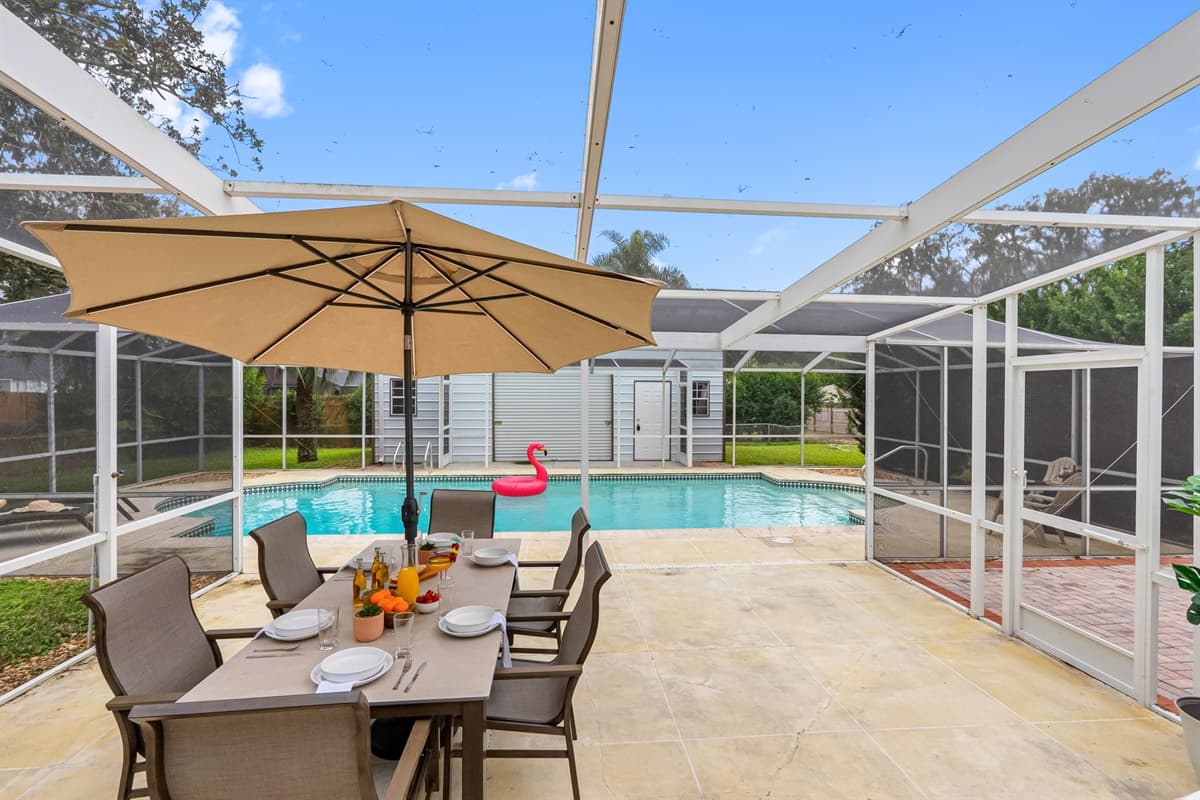Bright and inviting pool space with ample seating for soaking up the Florida sunshine.