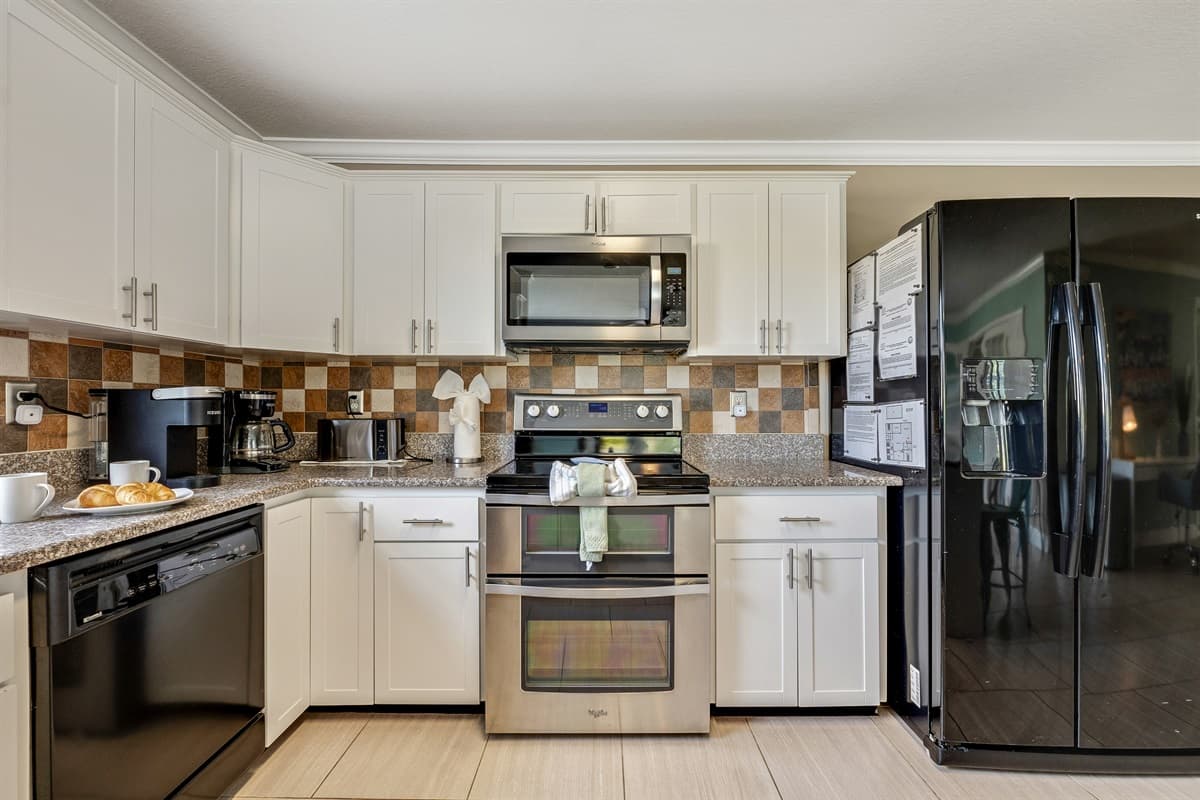 Step into our well-appointed kitchen, a haven for culinary enthusiasts and family gatherings alike.