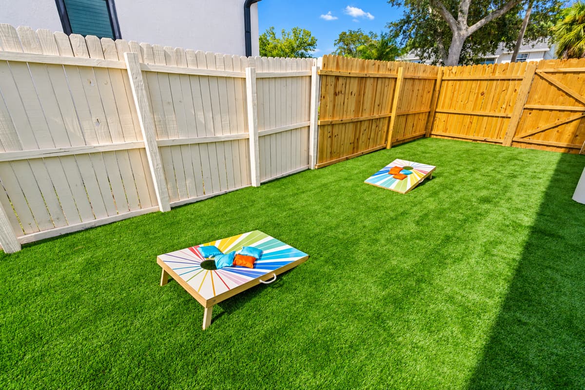 Challenge your group to a friendly match of cornhole or a putting contest on your very own mini golf course—fun for all ages right in the yard!