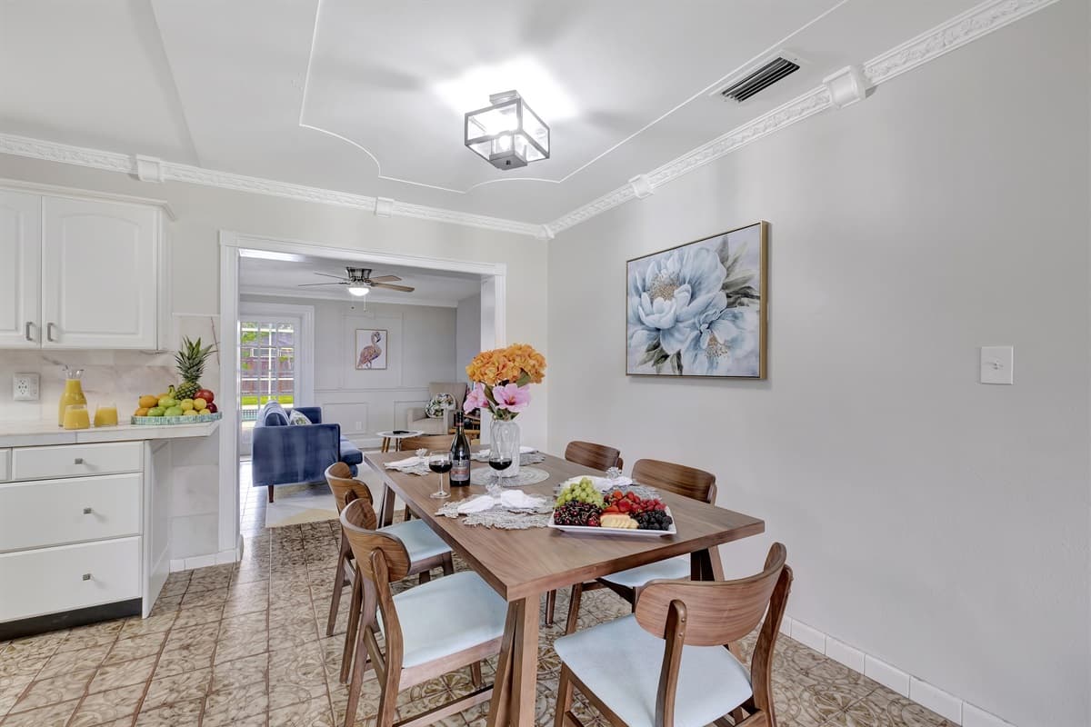 Whether it's a cozy family dinner or a lively get-together with friends, our wooden table is the perfect place to enjoy good food and great company.