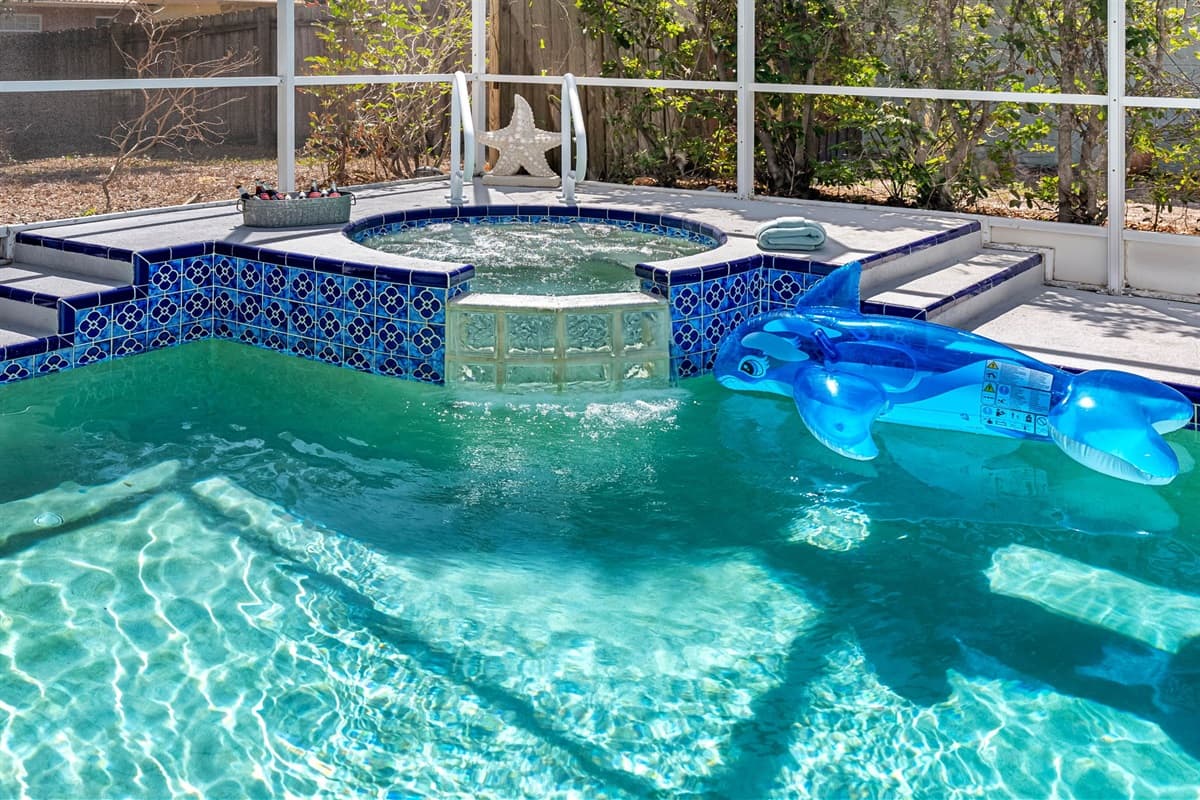 The crystal-clear pool invites you to take a dip and unwind at your own pace.