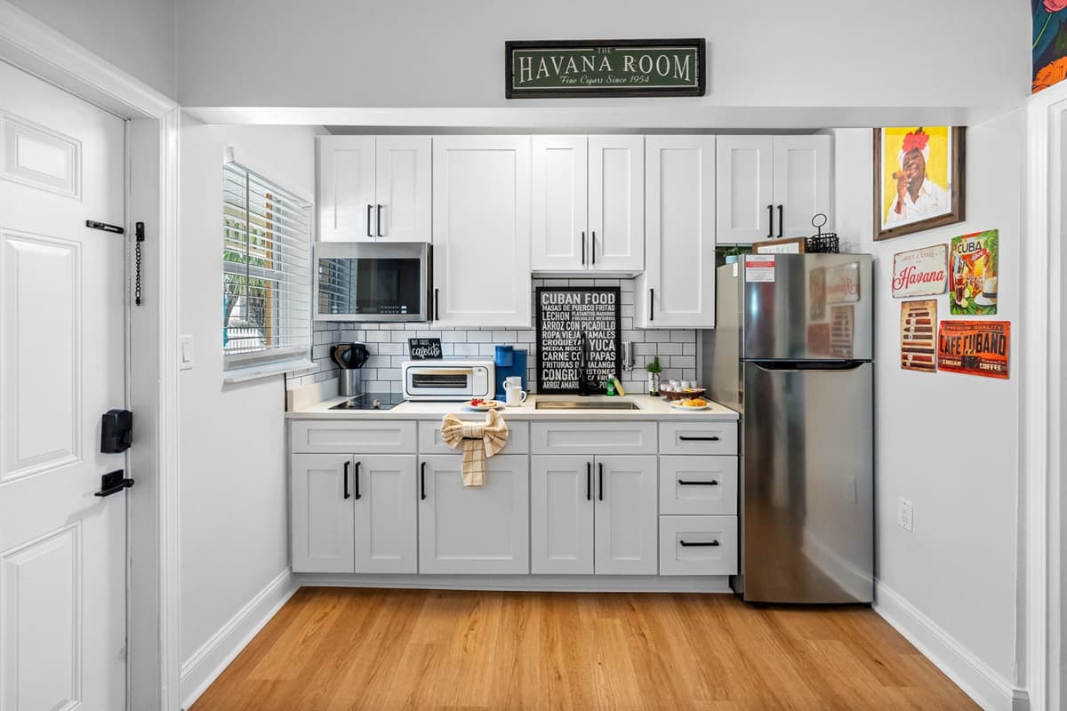 The fully functional kitchen is a highlight, equipped with modern appliances and all the essentials for your culinary needs.